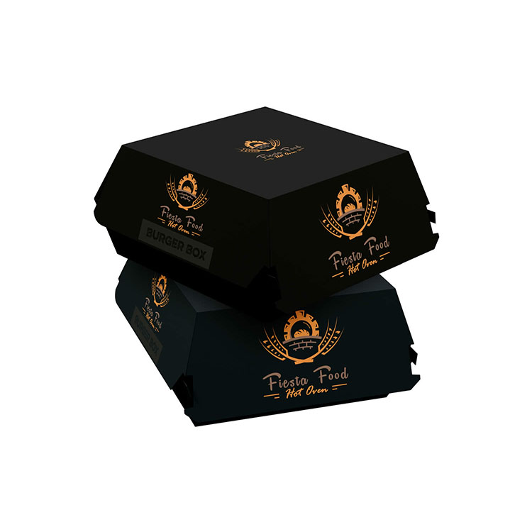 Two complete black burger boxes with gold-colored printed artwork