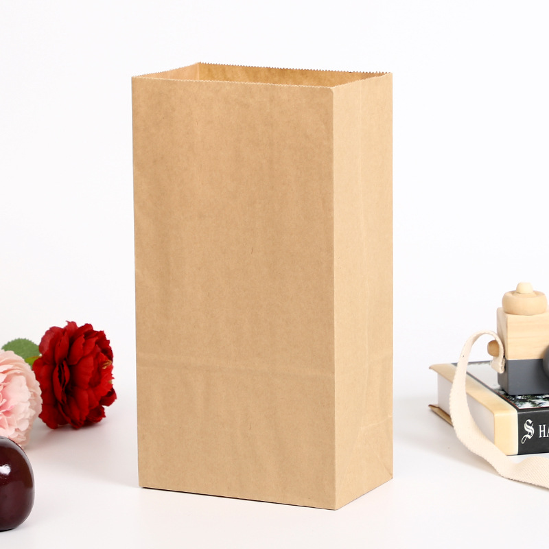 Complete unprinted brown square-bottom paper bag without handles